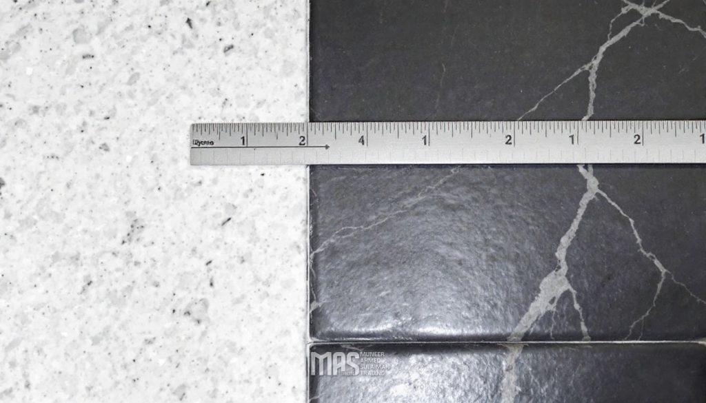 Common Tile Installation Mistakes to Avoid (And Why Choosing MAS Trading's Professional Team is Crucial) 2 freepik a clear visual of lippage where one tile edge is n 74061
